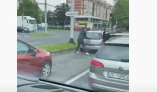 (VIDEO) ŽESTOKA TUČA NA SEMAFORU NAKON "ISECANJA" Sevale pesnice dva vozača, ali tu nije bio kraj: ŠOK SNIMAK SA ULICA PRESTONICE