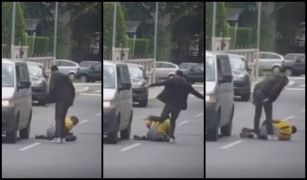 (UZNEMIRUJUĆI VIDEO) ŠOK SNIMAK SA DEDINJA! Nakon svađe u saobraćaju PRETUKAO ČOVEKA NASRED ULICE: Odbijao mu bubrege nogama dok je ležao na zemlji!