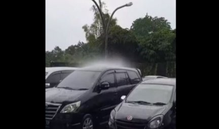 /VIDEO/ KAKO JE OVO MOGUĆE? Kiša pada na SAMO JEDAN automobil! Snimak napravio HAOS na internetu!