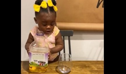 Snimak koji je oduševio 7 miliona ljudi: Šta to ova devojčica radi sa flašom soka i čašom?