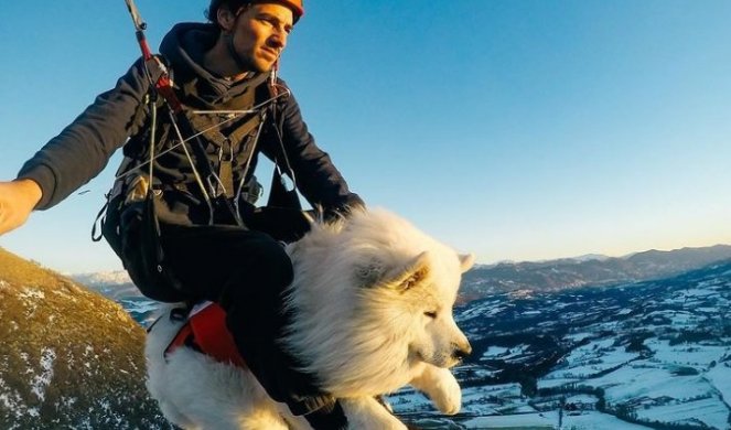 KAKAV TANDEM! Dečko i njegov samojed se bave PARAGLAJDINGOM - tvrdi da pas maksimalno UŽIVA, a evo i kako ga je izdresirao! (VIDEO)