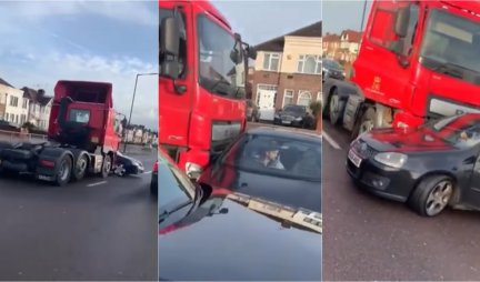 PA KAKO, ČOVEČE? Kamion pokupio auto i gurao ulicom - "NISAM GA VIDEO"! (VIDEO)