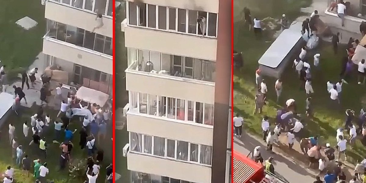 (VIDEO) Svoju decu bacali kroz prozor! Pogledajte stravični prizor, zgrada se zapalila, a skok bio jedina nada