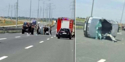 Haos kod Surčina: Auto prevrnut na bok, srča po putu, svi se pitaju šta je sa putnicima? (FOTO/VIDEO)
